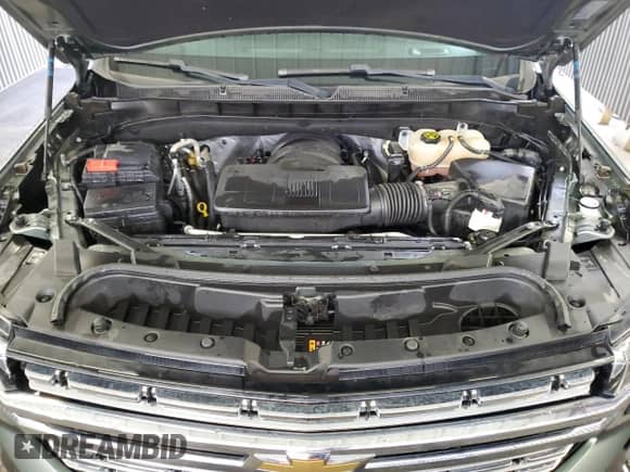 2023 Chevrolet Suburban Premier with VIN 1GNSCFKD8PR318691, listed as a Copart auction lot 87294985 with 94,427 mi miles and Clean title. Bid and sale history available at DreamBid. Image 12.