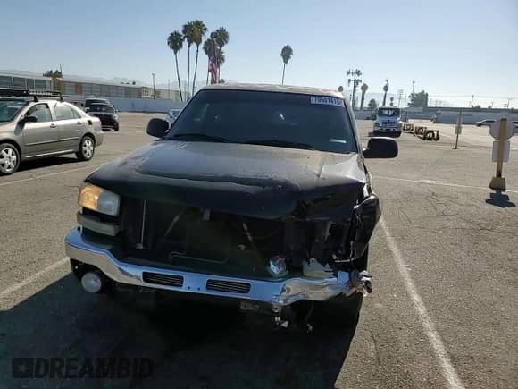 2006 GMC Sierra 1500 SLE1 z VIN 2GTEC13T161228725, wystawiony jako Copart lot #70601415 z przebiegiem 225 912 mil mil oraz Szkoda całkowita • Salvage title. Historia ofert i sprzedaży dostępna na DreamBid. Obrazek 14.