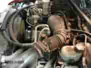 2002 Chevrolet Blazer LS z VIN 1GNDT13W02K213365, wystawiony jako IAAI lot #42561803 z przebiegiem 112 894 mil mil oraz . Historia ofert i sprzedaży dostępna na DreamBid. Obrazek 20.