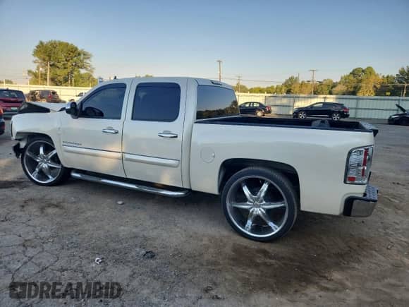 2012 Chevrolet Silverado 1500 LT with VIN 3GCPCSE05CG286602, listed as a Copart auction lot 82434025 with 165,841 mi miles and Salvage title. Bid and sale history available at DreamBid. Image 2.