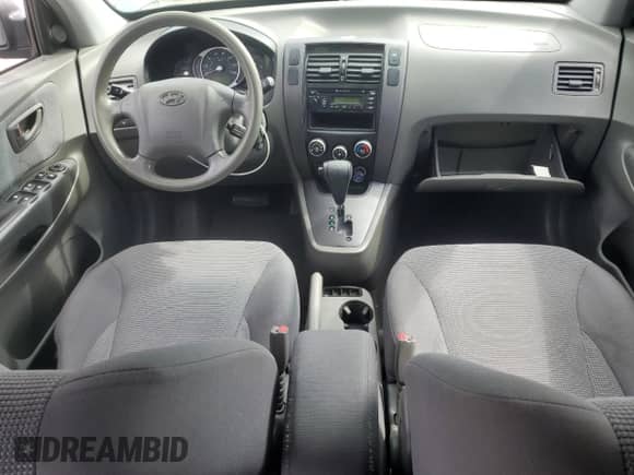 2006 Hyundai Tucson GL z VIN KM8JM12B86U436413, wystawiony jako Copart lot #69462885 z przebiegiem 156 051 mil mil oraz Szkoda całkowita • Salvage title. Historia ofert i sprzedaży dostępna na DreamBid. Obrazek 8.