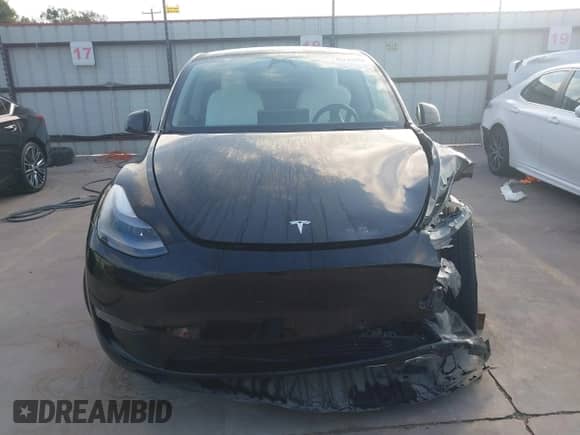 2023 Tesla Model Y Long Range z VIN 7SAYGAEE7PF767951, wystawiony jako IAAI lot #43128878 z przebiegiem 36 431 mil mil oraz . Historia ofert i sprzedaży dostępna na DreamBid. Obrazek 12.