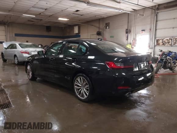 2023 BMW 3 Series 330i xDrive with VIN 3MW89FF00P8D57937, listed as a IAAI auction lot 43081403 with 19,195 mi miles and . Bid and sale history available at DreamBid. Image 3.