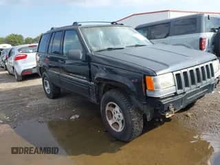 1998 Jeep Grand Cherokee with VIN 1J4FX48SXWC299291, listed as a IAAI auction lot 43122863 with 204,231 mi miles and . Bid and sale history available at DreamBid. Image 1.