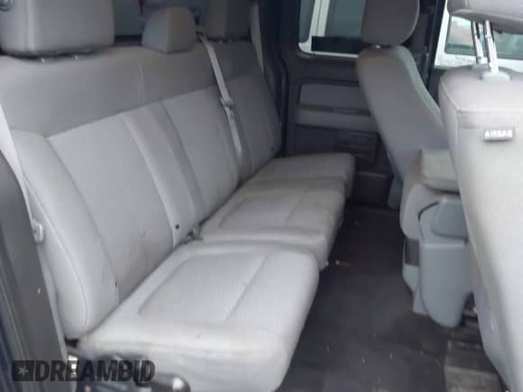 2013 Ford F-150 XL with VIN 1FTFX1EF4DFB93300, listed as a IAAI auction lot 43526340 with 218,182 mi miles and . Bid and sale history available at DreamBid. Image 8.