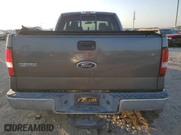 2004 Ford F-150 XL with VIN 1FTPX12504NA52326, listed as a Copart auction lot 82743415 with 254,627 mi miles and Clean title. Bid and sale history available at DreamBid. Image 6.