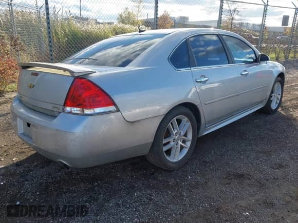 2015 Chevrolet Impala LTZ with VIN 2G1WC5E39F1142497, listed as a IAAI auction lot 43534604 with 135,948 mi miles and . Bid and sale history available at DreamBid. Image 4.