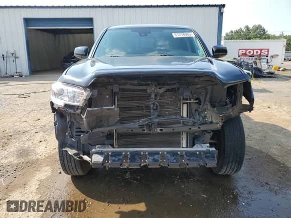 2018 Toyota Tacoma SR z VIN 5TFAX5GN2JX115996, wystawiony jako Copart lot #67276065 z przebiegiem 106 881 mil mil oraz Szkoda całkowita • Salvage title. Historia ofert i sprzedaży dostępna na DreamBid. Obrazek 5.