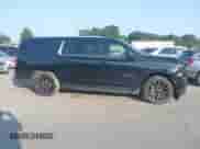 2023 Chevrolet Suburban LT with VIN 1GNSKCKD4PR250410, listed as a IAAI auction lot 42404471 with 71,552 mi miles and . Bid and sale history available at DreamBid. Image 13.