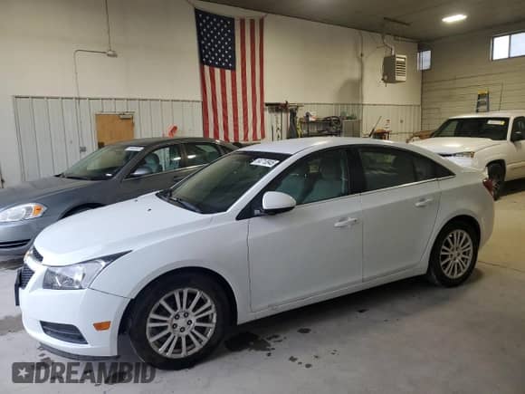 2012 Chevrolet Cruze ECO z VIN 1G1PJ5SC4C7296970, wystawiony jako Copart lot #84710945 z przebiegiem 79 417 mil mil oraz Szkoda całkowita • Salvage title. Historia ofert i sprzedaży dostępna na DreamBid. Obrazek 1.