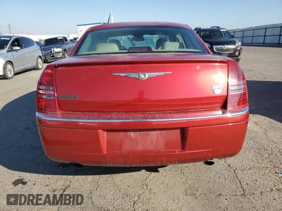 2006 Chrysler 300 C z VIN 2C3KA63H26H455628, wystawiony jako Copart lot #87068635 z przebiegiem 166 998 mil mil oraz Szkoda całkowita • Salvage title. Historia ofert i sprzedaży dostępna na DreamBid. Obrazek 6.
