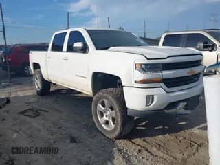 2017 Chevrolet Silverado 1500 LT with VIN 3GCUKREC4HG325132, listed as a IAAI auction lot 43300773 with 154,263 mi miles and . Bid and sale history available at DreamBid. Image 1.
