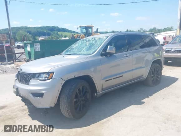 2017 Jeep Grand Cherokee Altitude with VIN 1C4RJFAG2HC714631, listed as a IAAI auction lot 42556625 with 89,662 mi miles and . Bid and sale history available at DreamBid. Image 2.