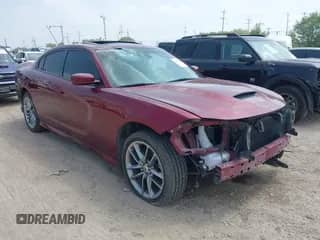 2021 Dodge Charger GT with VIN 2C3CDXMG2MH626205, listed as a IAAI auction lot 41912685 with 57,449 mi miles and . Bid and sale history available at DreamBid. Image 1.