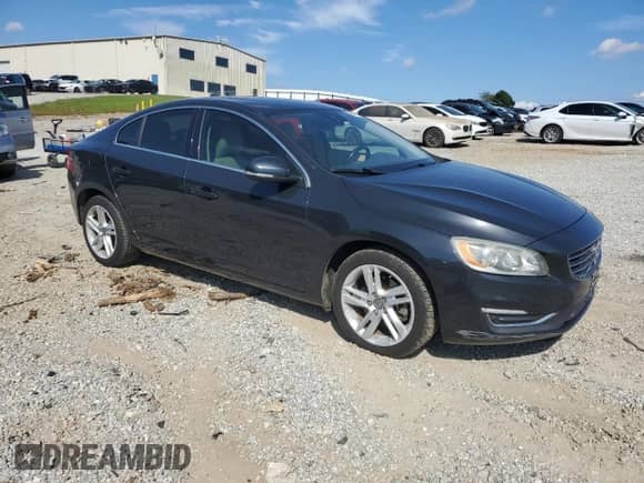 2015 Volvo S60 T5 Drive-E Premier with VIN YV140MFK0F1352395, listed as a Copart auction lot 80151995 with 152,034 mi miles and Salvage title. Bid and sale history available at DreamBid. Image 4.