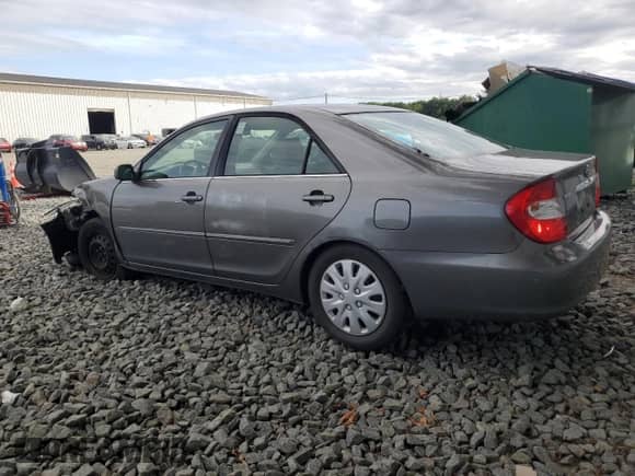 2002 Toyota Camry XLE z VIN 4T1BE30K72U609932, wystawiony jako Copart lot #69432835 z przebiegiem 92 299 mil mil oraz Szkoda całkowita • Salvage title. Historia ofert i sprzedaży dostępna na DreamBid. Obrazek 2.