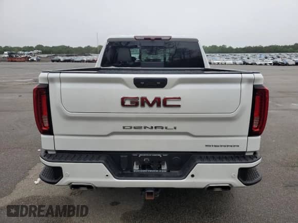 2023 GMC Sierra 1500 Denali z VIN 1GTUUGED3PZ109844, wystawiony jako Copart lot #59780445 z przebiegiem 32 409 mil mil oraz Szkoda całkowita • Salvage title. Historia ofert i sprzedaży dostępna na DreamBid. Obrazek 6.