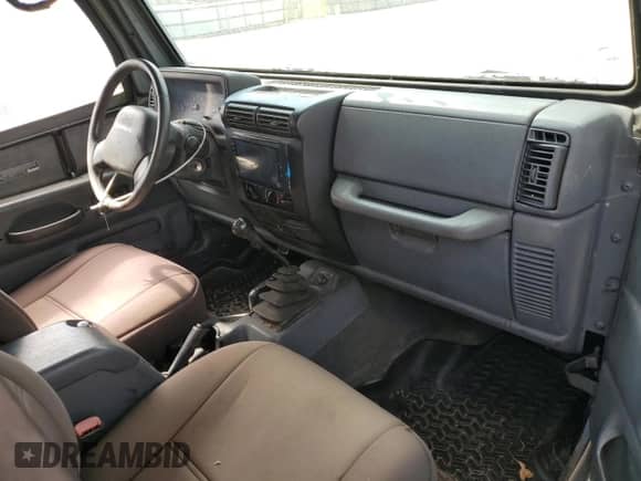 2001 Jeep Wrangler SE with VIN 1J4FA29P41P355548, listed as a Copart auction lot 56214205 with 173,125 mi miles and Clean title. Bid and sale history available at DreamBid. Image 8.