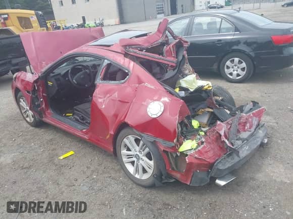 2007 Hyundai Tiburon GS z VIN KMHHM66D47U239778, wystawiony jako IAAI lot #42652083 z przebiegiem 174 508 mil mil oraz . Historia ofert i sprzedaży dostępna na DreamBid. Obrazek 3.