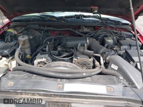 2000 Chevrolet Blazer LT z VIN 1GNDT13W6Y2286541, wystawiony jako IAAI lot #42640267 z przebiegiem 166 500 mil mil oraz . Historia ofert i sprzedaży dostępna na DreamBid. Obrazek 10.