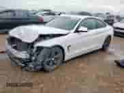 2015 BMW 4 Series 428i z VIN WBA3N7C59FK222559, wystawiony jako Copart lot #60604025 z przebiegiem 151 375 mil mil oraz Szkoda całkowita • Salvage title. Historia ofert i sprzedaży dostępna na DreamBid. Obrazek 1.
