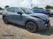 2025 Mazda CX-5 S Carbon Edition с VIN JM3KFBCMXS0655066, выставлен на аукционе Copart как лот 66453165 с пробегом 1 559 миль миль и Списание • Salvage title. История ставок и продаж доступна на DreamBid. Изображение 4.