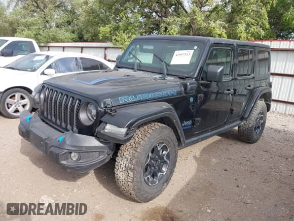2022 Jeep Wrangler Unlimited Rubicon with VIN 1C4JJXR63NW228550, listed as a IAAI auction lot 41957313 with 15,860 mi miles and . Bid and sale history available at DreamBid. Image 2.