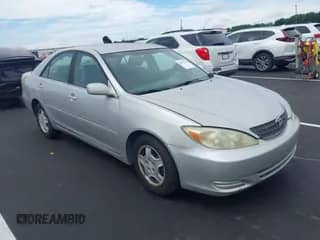 2002 Toyota Camry XLE with VIN 4T1BF32K52U028908, listed as a IAAI auction lot 42975341 with 355,815 mi miles and . Bid and sale history available at DreamBid. Image 1.
