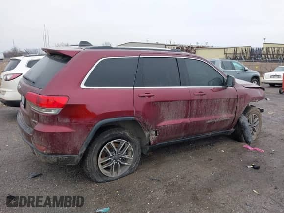 2019 Jeep Grand Cherokee Altitude with VIN 1C4RJFAG8KC669301, listed as a IAAI auction lot 41199214 with 98,183 mi miles and . Bid and sale history available at DreamBid. Image 4.