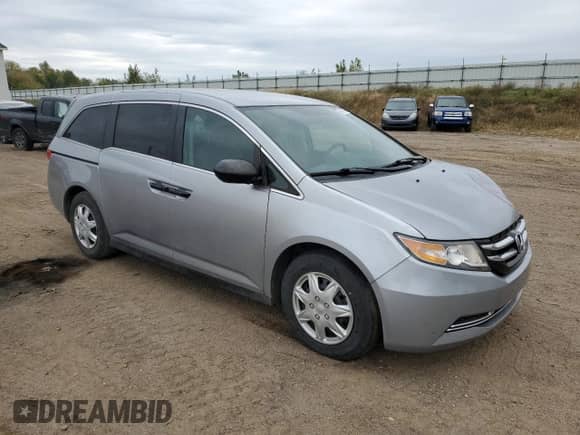 2016 Honda Odyssey LX with VIN 5FNRL5H26GB103453, listed as a Copart auction lot 86080625 with 97,833 mi miles and Salvage title. Bid and sale history available at DreamBid. Image 4.