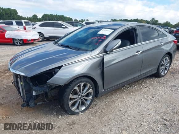 2013 Hyundai Sonata SE with VIN 5NPEC4ABXDH615085, listed as a IAAI auction lot 43450610 with 206,587 mi miles and . Bid and sale history available at DreamBid. Image 2.