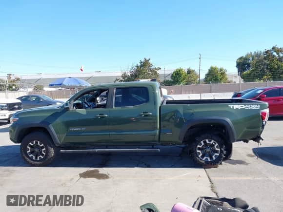 2021 Toyota Tacoma SR5 z VIN 3TMDZ5BN8MM114649, wystawiony jako IAAI lot #43493615 z przebiegiem 63 288 mil mil oraz . Historia ofert i sprzedaży dostępna na DreamBid. Obrazek 15.