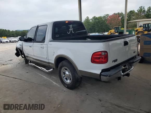 2002 Ford F-150 XLT with VIN 1FTRW07L42KB41425, listed as a Copart auction lot 69473745 with Not provided miles and Salvage title. Bid and sale history available at DreamBid. Image 2.