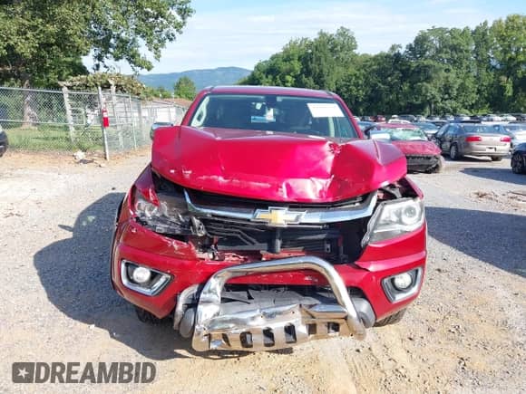 2015 Chevrolet Colorado 4WD LT z VIN 1GCGTBE31F1184744, wystawiony jako IAAI lot #42988122 z przebiegiem 122 987 mil mil oraz . Historia ofert i sprzedaży dostępna na DreamBid. Obrazek 13.