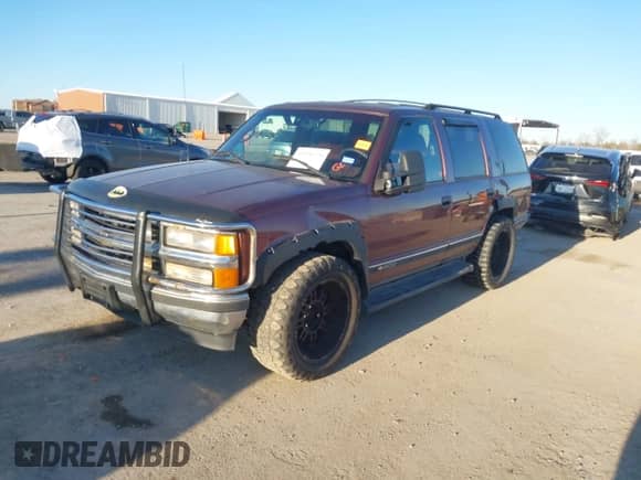 1996 Chevrolet Tahoe с VIN 1GNEK13R9TJ408499, выставлен на аукционе IAAI как лот 41308726 с пробегом 118 336 миль миль и . История ставок и продаж доступна на DreamBid. Изображение 2.
