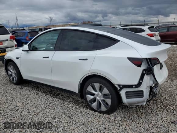 2023 Tesla Model Y Long Range с VIN 7SAYGAEE9PF584339, выставлен на аукционе Copart как лот 56988655 с пробегом Не указан миль и Списание • Salvage title. История ставок и продаж доступна на DreamBid. Изображение 2.
