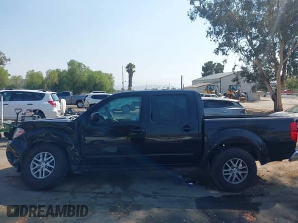2016 Nissan Frontier S with VIN 1N6AD0ER7GN794439, listed as a IAAI auction lot 42985307 with 153,619 mi miles and . Bid and sale history available at DreamBid. Image 14.