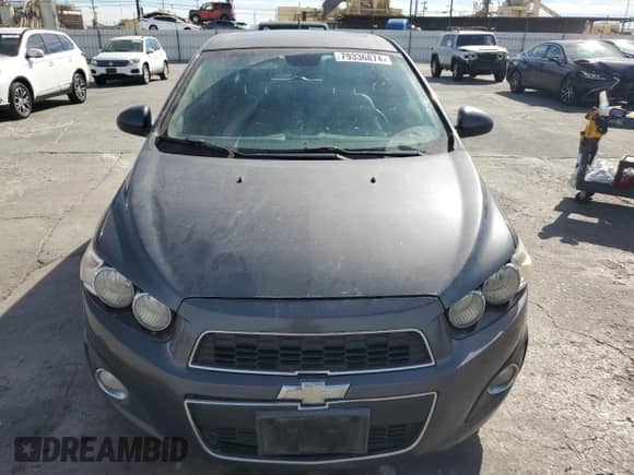 2012 Chevrolet Sonic LTZ с VIN 1G1JF6SB0C4174080, выставлен на аукционе Copart как лот 79336874 с пробегом 147 609 миль миль и Чистый • Clean title. История ставок и продаж доступна на DreamBid. Изображение 5.