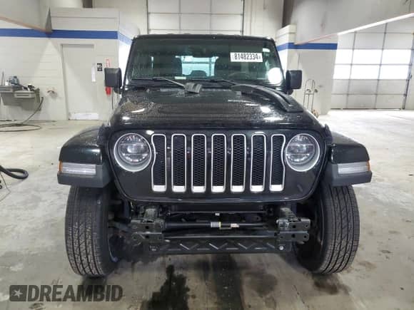 2021 Jeep Wrangler Unlimited Sahara High Altitude with VIN 1C4HJXEG9MW571844, listed as a Copart auction lot 81482334 with 77,409 mi miles and Salvage title. Bid and sale history available at DreamBid. Image 5.
