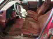 1991 Dodge Spirit with VIN 1B3XA46K7MF556659, listed as a Copart auction lot 63274095 with 107,254 mi miles and Salvage title. Bid and sale history available at DreamBid. Image 7.