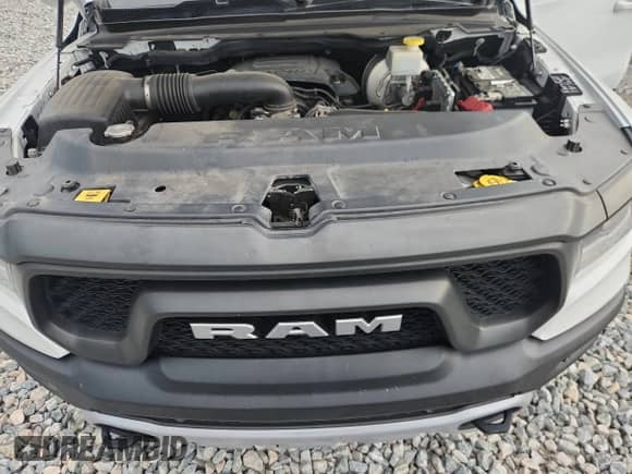 2019 Ram 1500 Rebel z VIN 1C6SRFLT2KN899920, wystawiony jako Copart lot #61851335 z przebiegiem 139 544 mil mil oraz Szkoda całkowita • Salvage title. Historia ofert i sprzedaży dostępna na DreamBid. Obrazek 11.