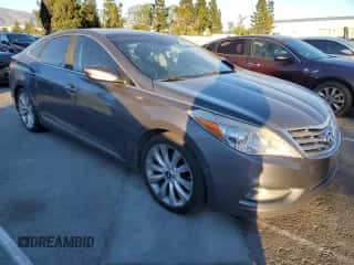 2012 Hyundai Azera с VIN KMHFH4JG4CA168501, выставлен на аукционе Copart как лот 87532345 с пробегом 161 245 миль миль и Чистый • Clean title. История ставок и продаж доступна на DreamBid. Изображение 4.