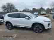 2019 Hyundai Santa Fe Ultimate с VIN 5NMS5CAAXKH131278, выставлен на аукционе IAAI как лот 41860473 с пробегом 106 654 миль миль и . История ставок и продаж доступна на DreamBid. Изображение 14.