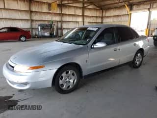 2002 Saturn LS with VIN 1G8JU54F12Y563674, listed as a Copart auction lot 63756255 with 77,822 mi miles and Salvage title. Bid and sale history available at DreamBid. Image 1.