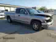 1999 Dodge Dakota SLT with VIN 1B7GL22X0XS108886, listed as a Copart auction lot 81113005 with 188,072 mi miles and Salvage title. Bid and sale history available at DreamBid. Image 4.
