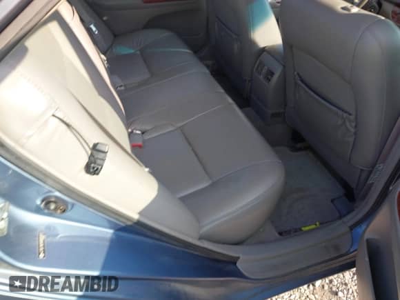 2004 Toyota Camry LE z VIN 4T1BE30K94U893597, wystawiony jako IAAI lot #42987871 z przebiegiem 143 430 mil mil oraz . Historia ofert i sprzedaży dostępna na DreamBid. Obrazek 8.