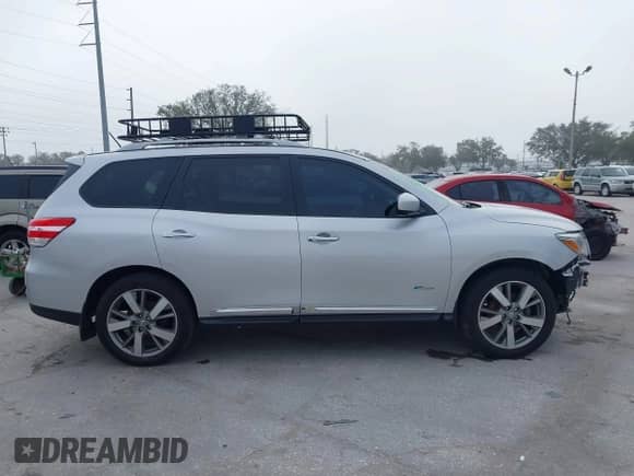 2014 Nissan Pathfinder Platinum Hybrid with VIN 5N1CR2MM5EC643103, listed as a IAAI auction lot 41243310 with 90,162 mi miles and . Bid and sale history available at DreamBid. Image 14.