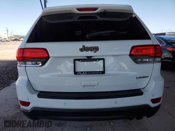 2018 Jeep Grand Cherokee Laredo z VIN 1C4RJEAG7JC480700, wystawiony jako Copart lot #56788835 z przebiegiem Nie podano mil oraz Szkoda całkowita • Salvage title. Historia ofert i sprzedaży dostępna na DreamBid. Obrazek 6.