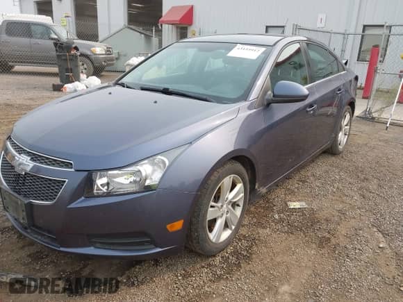 2014 Chevrolet Cruze Diesel with VIN 1G1P75SZ9E7100432, listed as a IAAI auction lot 43155912 with 204,206 mi miles and . Bid and sale history available at DreamBid. Image 2.