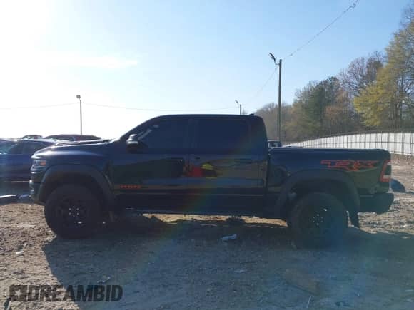 2021 Ram 1500 TRX с VIN 1C6SRFU99MN758770, выставлен на аукционе IAAI как лот 38873371 с пробегом 59 097 миль миль и . История ставок и продаж доступна на DreamBid. Изображение 14.